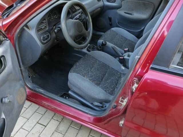 Красный Дэу Сенс, объемом двигателя 1.5 л и пробегом 158 тыс. км за 1350 $, фото 6 на Automoto.ua