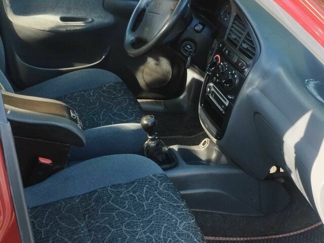 Красный Дэу Сенс, объемом двигателя 1.6 л и пробегом 305 тыс. км за 2150 $, фото 4 на Automoto.ua