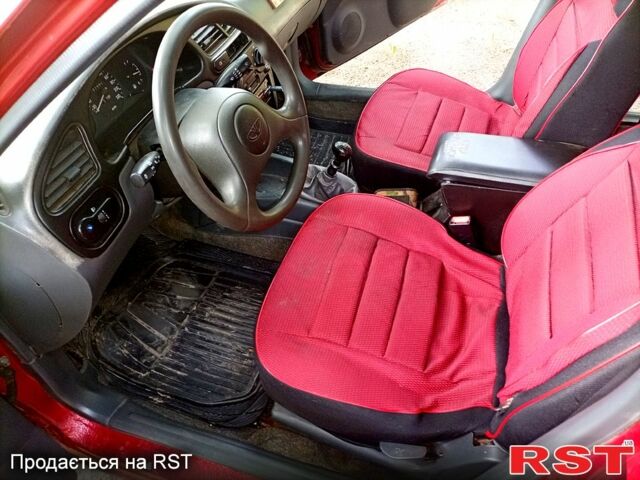 Красный Дэу Сенс, объемом двигателя 1.3 л и пробегом 231 тыс. км за 1800 $, фото 9 на Automoto.ua