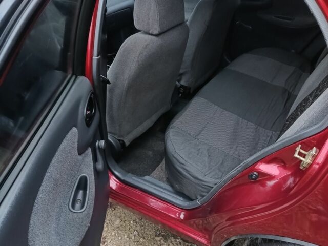 Красный Дэу Сенс, объемом двигателя 1.5 л и пробегом 270 тыс. км за 1950 $, фото 9 на Automoto.ua