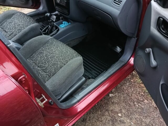 Красный Дэу Сенс, объемом двигателя 1.5 л и пробегом 270 тыс. км за 1950 $, фото 8 на Automoto.ua