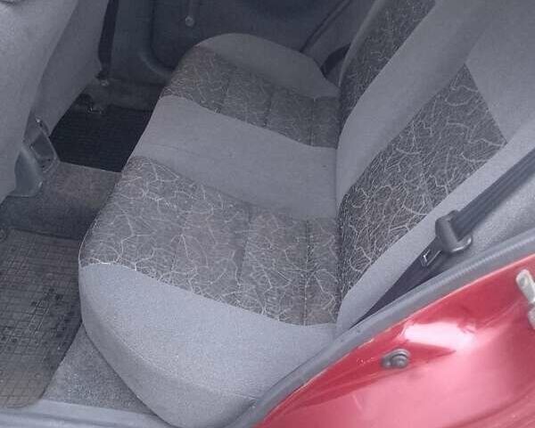 Червоний Деу Сенс, об'ємом двигуна 1.3 л та пробігом 184 тис. км за 1547 $, фото 4 на Automoto.ua