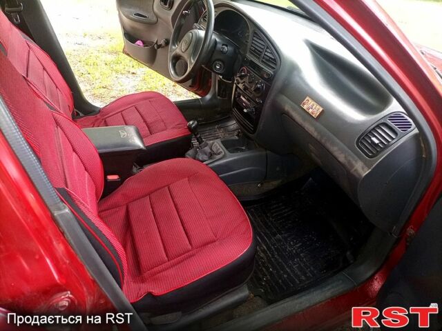 Красный Дэу Сенс, объемом двигателя 1.3 л и пробегом 231 тыс. км за 1800 $, фото 11 на Automoto.ua
