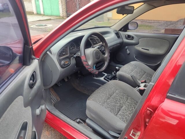 Красный Дэу Сенс, объемом двигателя 1.4 л и пробегом 254 тыс. км за 1500 $, фото 6 на Automoto.ua