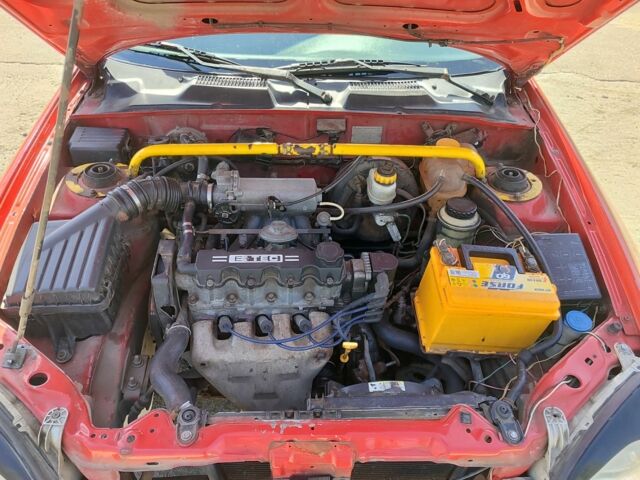 Красный Дэу Сенс, объемом двигателя 1.5 л и пробегом 1 тыс. км за 1150 $, фото 16 на Automoto.ua