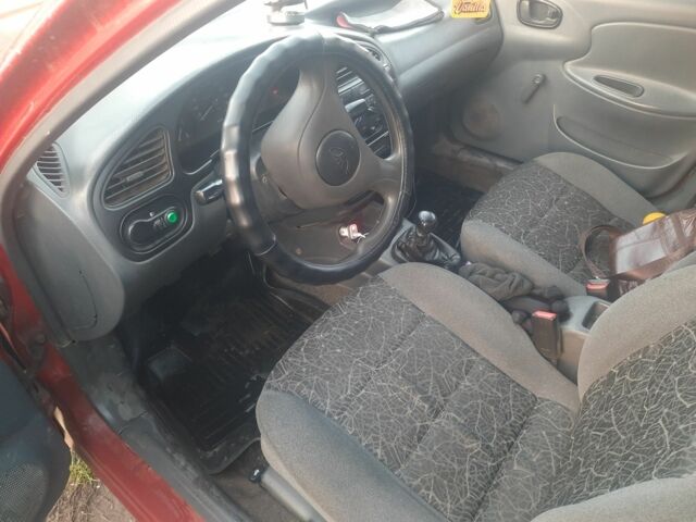 Красный Дэу Сенс, объемом двигателя 1.5 л и пробегом 162 тыс. км за 1654 $, фото 5 на Automoto.ua