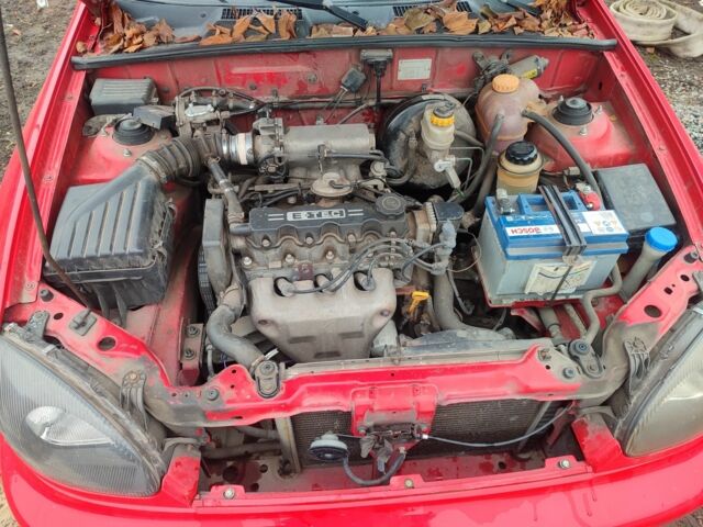 Красный Дэу Сенс, объемом двигателя 1.5 л и пробегом 200 тыс. км за 2400 $, фото 5 на Automoto.ua