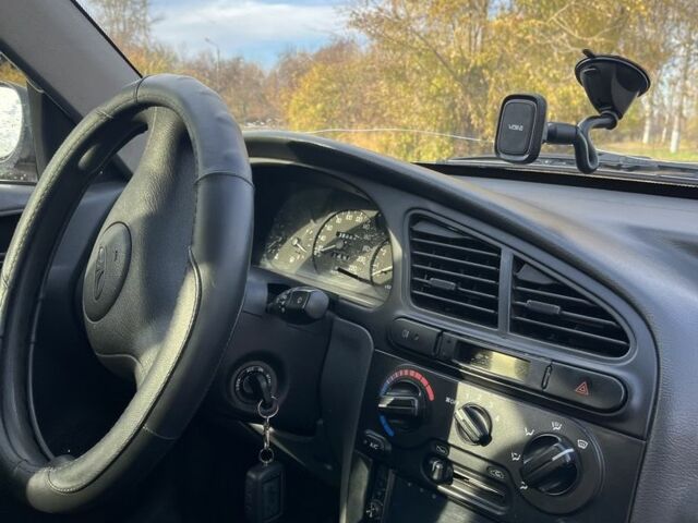 Красный Дэу Сенс, объемом двигателя 1.5 л и пробегом 222 тыс. км за 1800 $, фото 6 на Automoto.ua