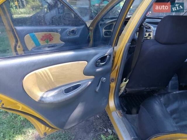 Желтый Дэу Сенс, объемом двигателя 1.3 л и пробегом 281 тыс. км за 1334 $, фото 12 на Automoto.ua