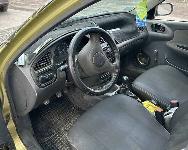 Жовтий Деу Сенс, об'ємом двигуна 1.4 л та пробігом 242 тис. км за 2000 $, фото 10 на Automoto.ua