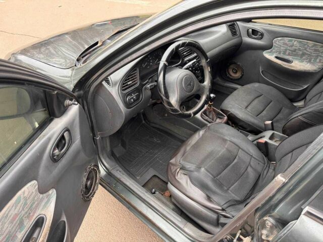 Серый Дэу Сенс, объемом двигателя 1.5 л и пробегом 250 тыс. км за 1250 $, фото 8 на Automoto.ua