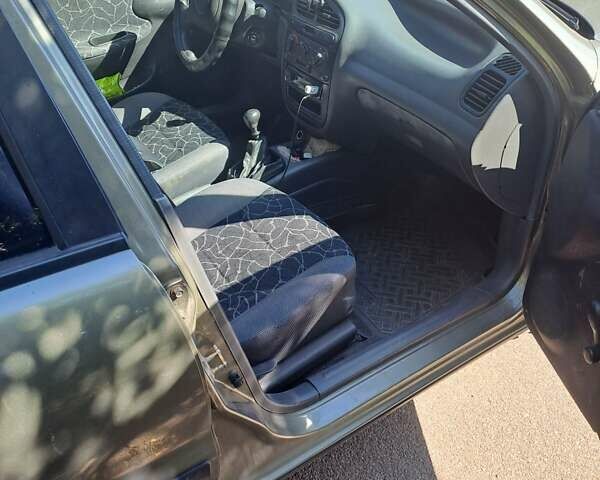 Сірий Деу Сенс, об'ємом двигуна 1.3 л та пробігом 215 тис. км за 1800 $, фото 3 на Automoto.ua