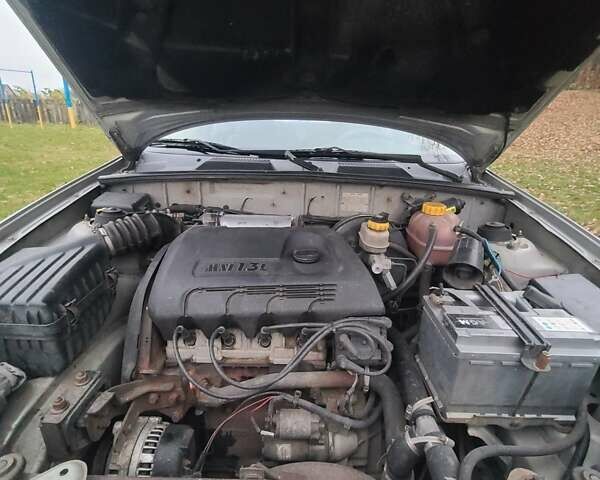 Серый Дэу Сенс, объемом двигателя 1.3 л и пробегом 255 тыс. км за 1500 $, фото 12 на Automoto.ua