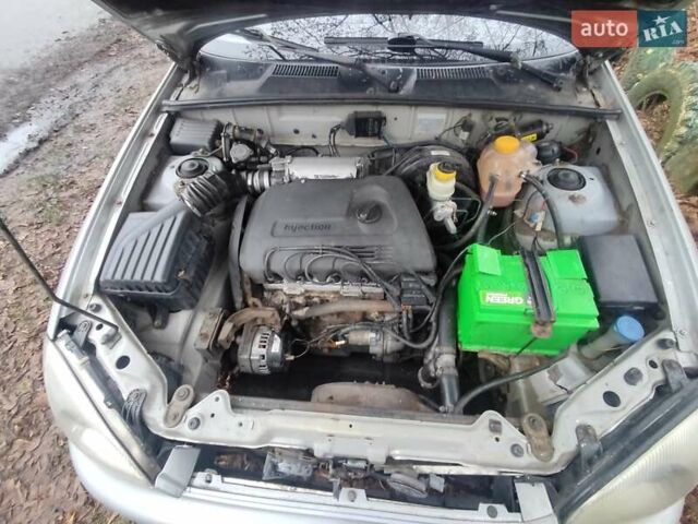 Серый Дэу Сенс, объемом двигателя 1.3 л и пробегом 219 тыс. км за 1654 $, фото 6 на Automoto.ua