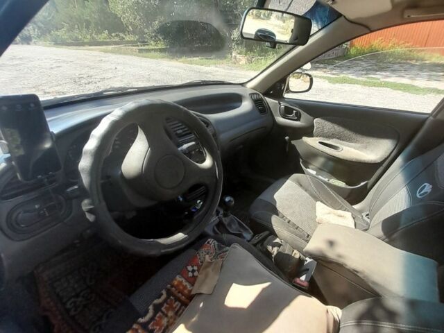 Сірий Деу Сенс, об'ємом двигуна 1.5 л та пробігом 406 тис. км за 2000 $, фото 4 на Automoto.ua