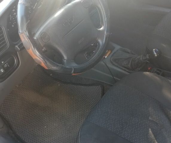 Сірий Деу Сенс, об'ємом двигуна 1.6 л та пробігом 243 тис. км за 2999 $, фото 5 на Automoto.ua