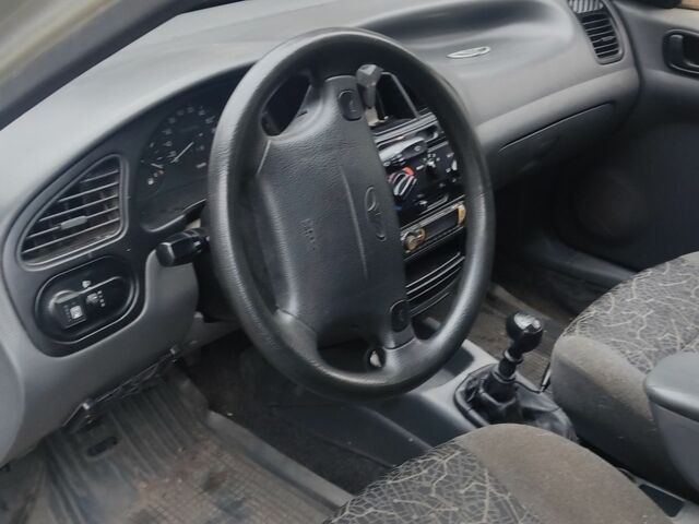 Серый Дэу Сенс, объемом двигателя 1.6 л и пробегом 147 тыс. км за 1999 $, фото 6 на Automoto.ua