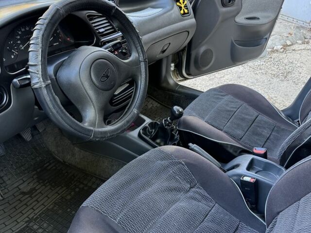 Серый Дэу Сенс, объемом двигателя 1.5 л и пробегом 107 тыс. км за 2000 $, фото 6 на Automoto.ua