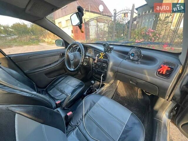 Серый Дэу Сенс, объемом двигателя 1.5 л и пробегом 242 тыс. км за 2000 $, фото 7 на Automoto.ua