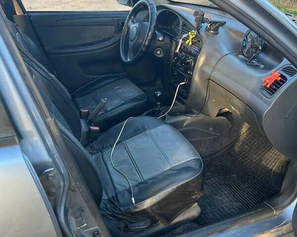 Серый Дэу Сенс, объемом двигателя 1.5 л и пробегом 242 тыс. км за 2000 $, фото 6 на Automoto.ua