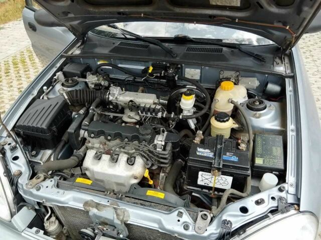 Серый Дэу Сенс, объемом двигателя 1.5 л и пробегом 139 тыс. км за 2059 $, фото 4 на Automoto.ua