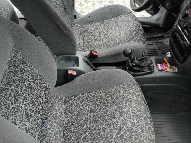 Серый Дэу Сенс, объемом двигателя 1.5 л и пробегом 139 тыс. км за 2059 $, фото 5 на Automoto.ua