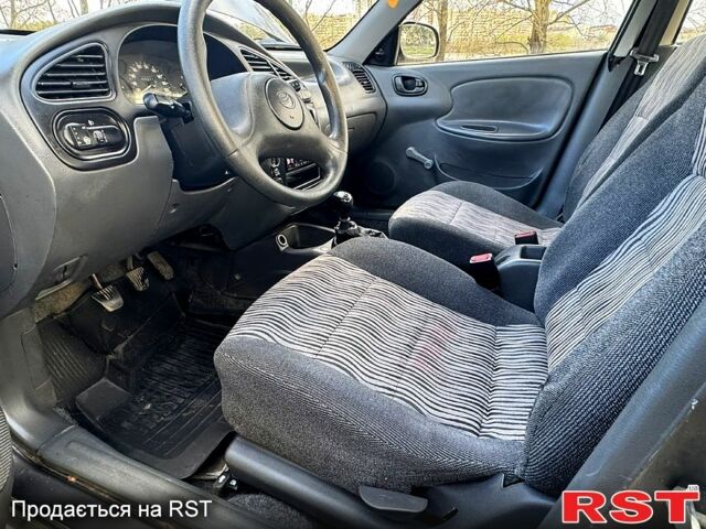 Серый Дэу Сенс, объемом двигателя 1.3 л и пробегом 255 тыс. км за 1900 $, фото 5 на Automoto.ua