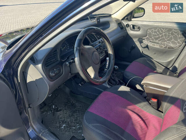 Синий Дэу Сенс, объемом двигателя 1.3 л и пробегом 206 тыс. км за 2200 $, фото 6 на Automoto.ua