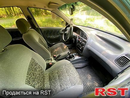 Синий Дэу Сенс, объемом двигателя 1.3 л и пробегом 225 тыс. км за 1750 $, фото 4 на Automoto.ua