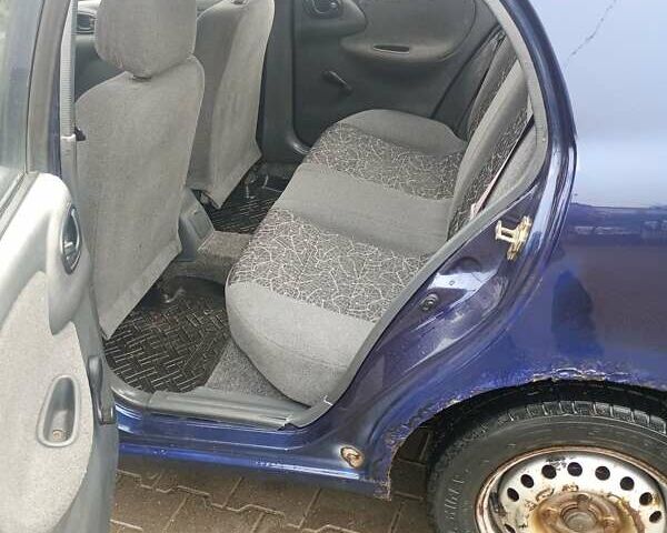 Синий Дэу Сенс, объемом двигателя 1.3 л и пробегом 305 тыс. км за 800 $, фото 7 на Automoto.ua