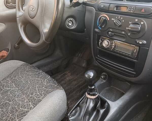 Синий Дэу Сенс, объемом двигателя 1.3 л и пробегом 108 тыс. км за 2500 $, фото 18 на Automoto.ua