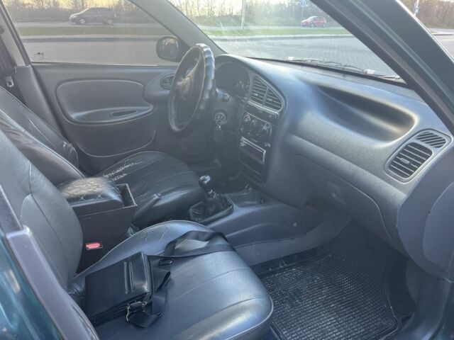 Зелений Деу Сенс, об'ємом двигуна 1.5 л та пробігом 250 тис. км за 1899 $, фото 4 на Automoto.ua