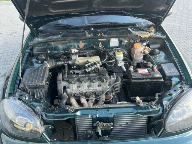 Зелений Деу Сенс, об'ємом двигуна 1.5 л та пробігом 250 тис. км за 1899 $, фото 6 на Automoto.ua