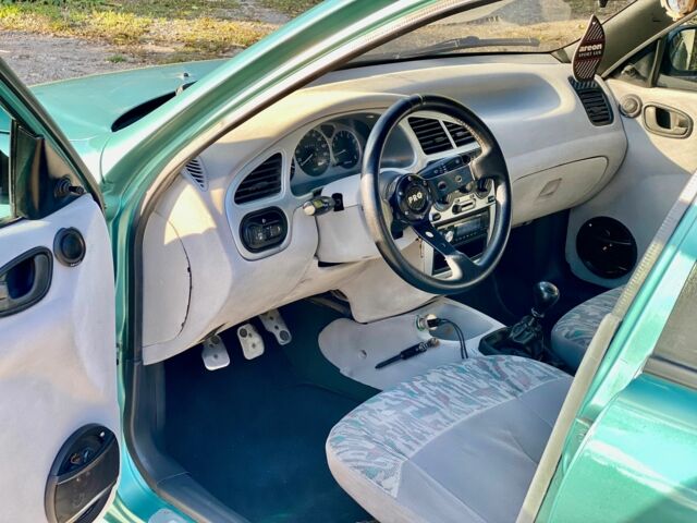 Деу Сенс 1998 у Кам'янське (Дніпродзержинськ) на Automoto.ua Зелений Деу Сенс, об'ємом двигуна 2 л та пробігом 235 тис. км за 1999 $, фото 8 на Automoto.ua