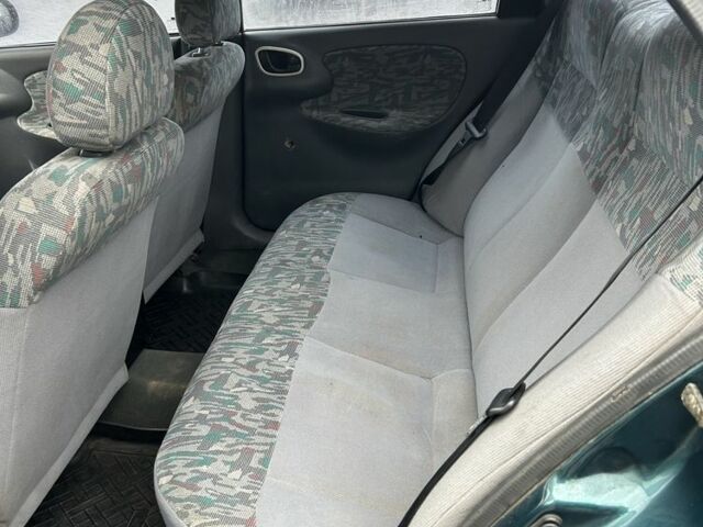 Зелений Деу Сенс, об'ємом двигуна 1.5 л та пробігом 250 тис. км за 1450 $, фото 15 на Automoto.ua