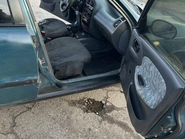 Зелений Деу Сенс, об'ємом двигуна 1.5 л та пробігом 213 тис. км за 1111 $, фото 8 на Automoto.ua