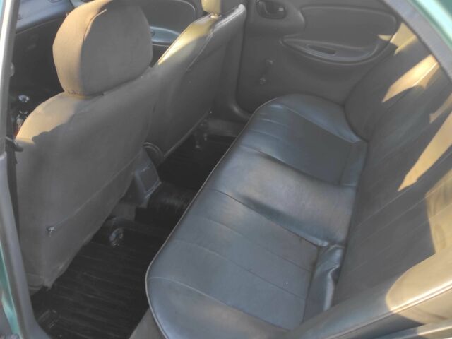 Зеленый Дэу Сенс, объемом двигателя 1.5 л и пробегом 290 тыс. км за 2000 $, фото 4 на Automoto.ua