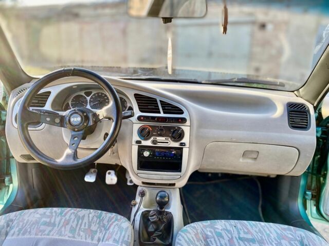 Деу Сенс 1998 у Кам'янське (Дніпродзержинськ) на Automoto.ua Зелений Деу Сенс, об'ємом двигуна 2 л та пробігом 235 тис. км за 1999 $, фото 13 на Automoto.ua
