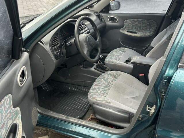 Зелений Деу Сенс, об'ємом двигуна 1.5 л та пробігом 250 тис. км за 1450 $, фото 13 на Automoto.ua