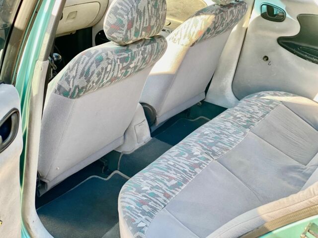 Деу Сенс 1998 у Кам'янське (Дніпродзержинськ) на Automoto.ua Зелений Деу Сенс, об'ємом двигуна 2 л та пробігом 235 тис. км за 1999 $, фото 10 на Automoto.ua