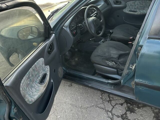 Зелений Деу Сенс, об'ємом двигуна 1.5 л та пробігом 213 тис. км за 1111 $, фото 6 на Automoto.ua