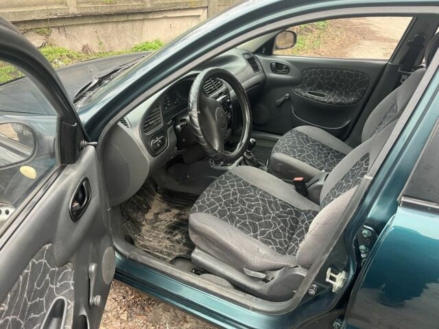 Зеленый Дэу Сенс, объемом двигателя 1.5 л и пробегом 222 тыс. км за 1950 $, фото 7 на Automoto.ua