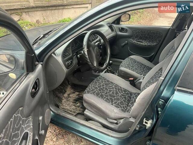 Зеленый Дэу Сенс, объемом двигателя 1.5 л и пробегом 222 тыс. км за 1950 $, фото 6 на Automoto.ua
