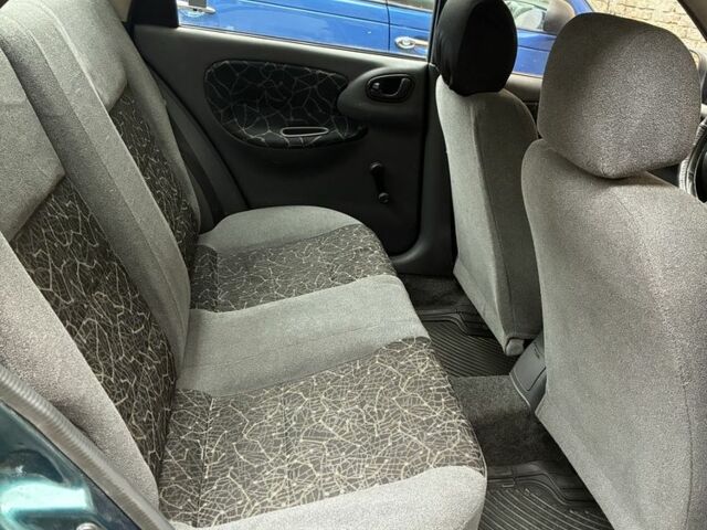 Зелений Деу Сенс, об'ємом двигуна 1.3 л та пробігом 151 тис. км за 2000 $, фото 5 на Automoto.ua