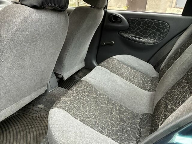 Зелений Деу Сенс, об'ємом двигуна 1.3 л та пробігом 151 тис. км за 2000 $, фото 4 на Automoto.ua