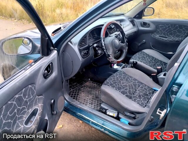 Зеленый Дэу Сенс, объемом двигателя 1.3 л и пробегом 309 тыс. км за 850 $, фото 4 на Automoto.ua