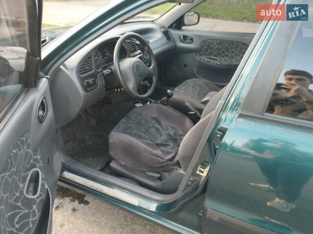 Зеленый Дэу Сенс, объемом двигателя 1.3 л и пробегом 71 тыс. км за 2000 $, фото 9 на Automoto.ua