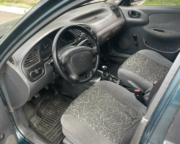 Зелений Деу Сенс, об'ємом двигуна 1.3 л та пробігом 250 тис. км за 1500 $, фото 7 на Automoto.ua