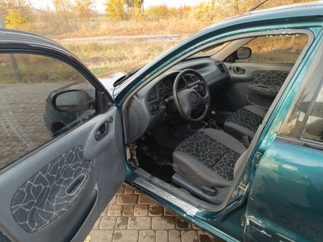 Зелений Деу Сенс, об'ємом двигуна 1.5 л та пробігом 190 тис. км за 1074 $, фото 9 на Automoto.ua