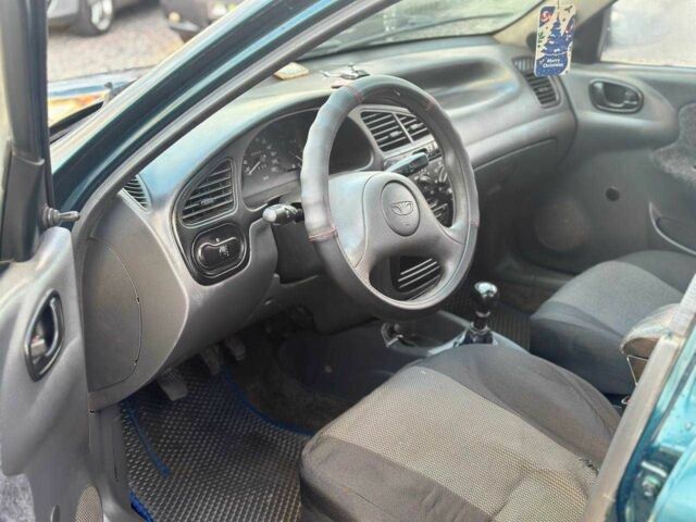 Зеленый Дэу Сенс, объемом двигателя 1.5 л и пробегом 330 тыс. км за 1700 $, фото 4 на Automoto.ua